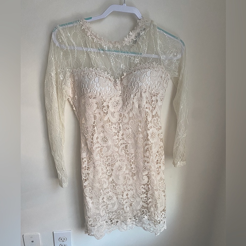 White lace dress with long lace sleeves